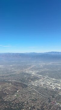 View of city of Los Angeles below from airplane during daytime