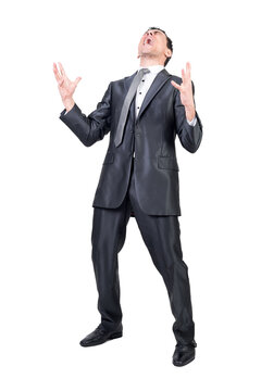 Full body of annoyed male entrepreneur screaming loudly and expressing rage against transparent background