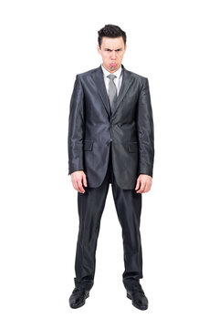 Comic male entrepreneur in suit feeling offended like child and pouting lips on transparent background in studio
