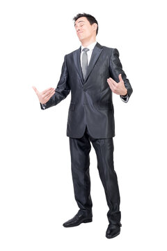 Full body of self confident male in elegant suit pointing at himself with closed eyes while standing isolated on transparent background