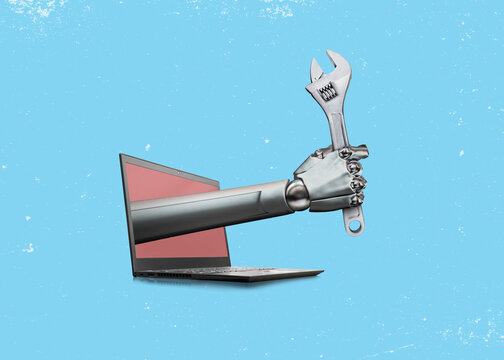 A robotic hand holding a wrench and reaching forward out of the laptop display.