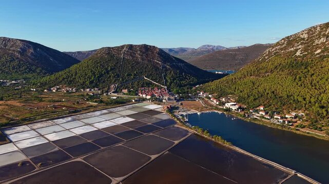 Aerial view of the historic salt pans and the ancient defensive walls of Ston in Croatia