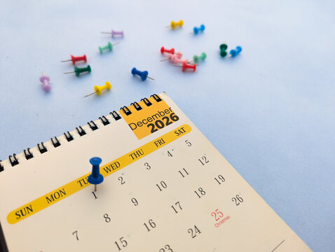First december date marked on calendar 2026 with push pin