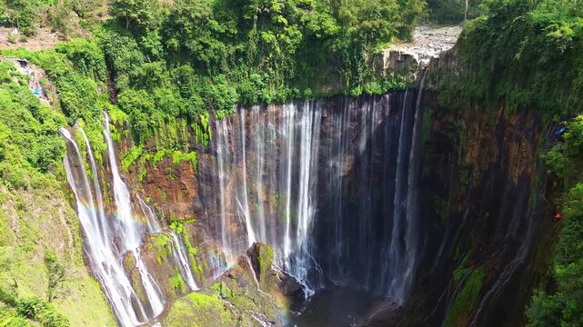 Wide Aerial Establishing Shot of Tumpak Sewu Waterfall