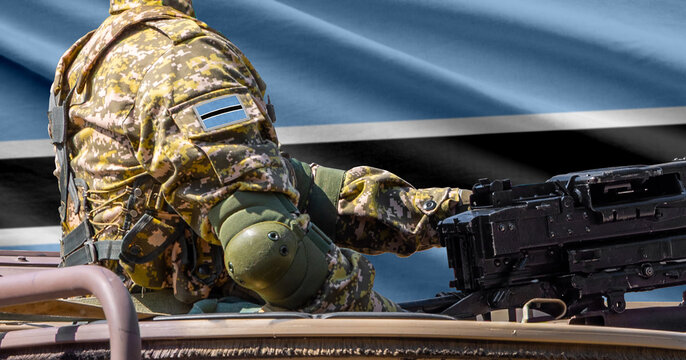 Botswana flag with soldier at machinegun turret