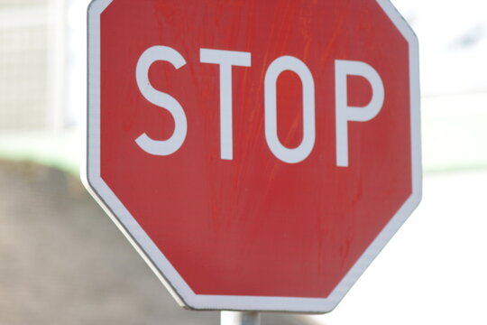 Stop sign close up on road