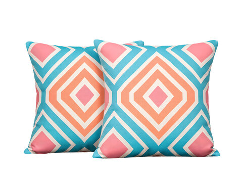 Two matching patterned cushions with colorful diamond motifs