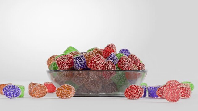 3d sugary gummy candies falling into a bowl, white background