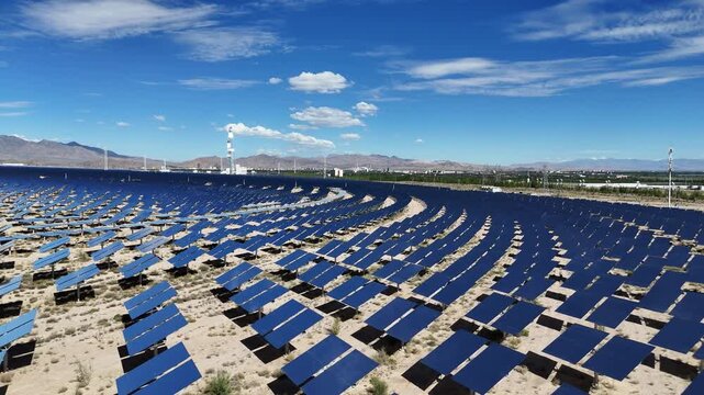 Panoramic view of solar thermal power station with parabolic mirrors