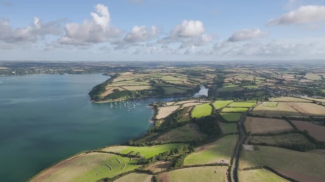 Farms and Fields over St Mawes from drone, Carrick Roads, River Fal, Falmouth, Cornwall, UK