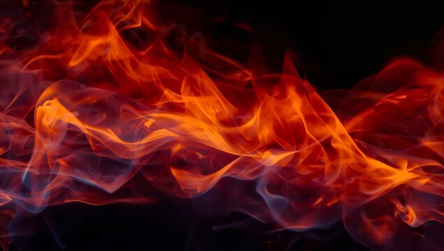 Close up abstract fire flames texture background with glowing orange and red burning blaze, hot wildfire and bonfire flame pattern on black background, perfect for danger, energy, heat, power and dest