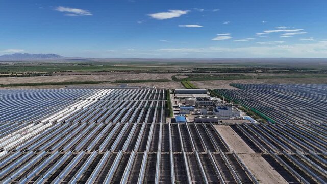 Panoramic view of the trough solar thermal power station under blue sky