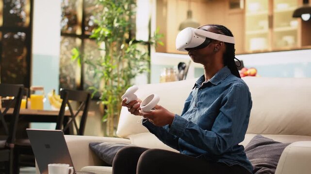 Young woman uses VR glasses for immersive 3D visualization, motion tracking for futuristic and innovative multitasking, person telecommuting.
