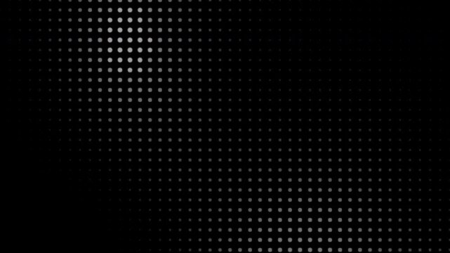 Abstract halftone dots creating black and white gradient background