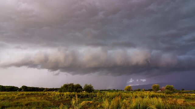 Timelapse of a wall cloud rolling in with thunderstorm over Utah during monsoon season.