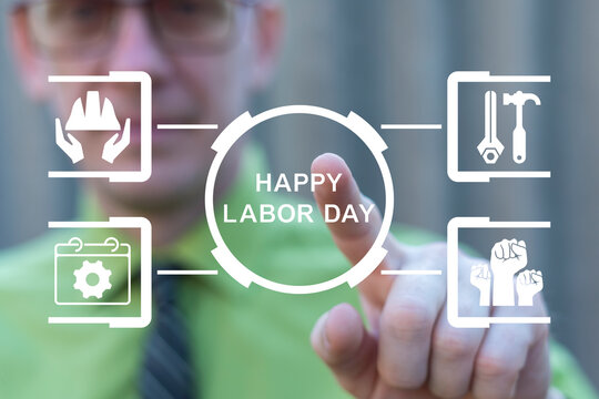 Businessman using virtual touchscreen presses the text HAPPY LABOR DAY. Concept of Happy Labor Day National Holiday Weekend.