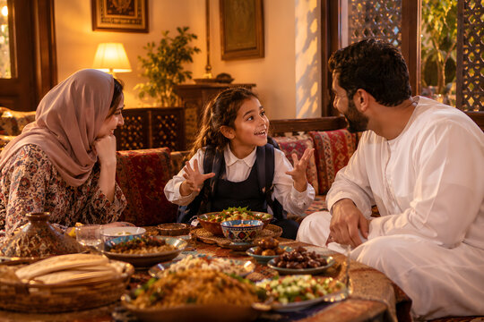 Child Sharing First Day Of School Stories At Dinner