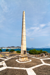 Obraz premium A view of the historic War Memorial obelisk standing on the waterfront in Basseterre, Saint Kitts and Nevis, under a clear sky
