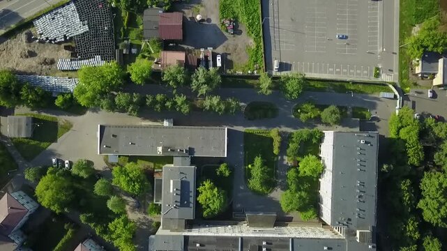 Descending nadir pass over hospital roofs
