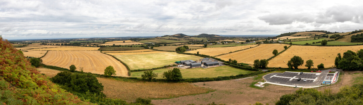 Panoramic elevated view of Ballycarroll farmland and rolling rural countryside seen from Rock of Dunamase, County Laois, Ireland