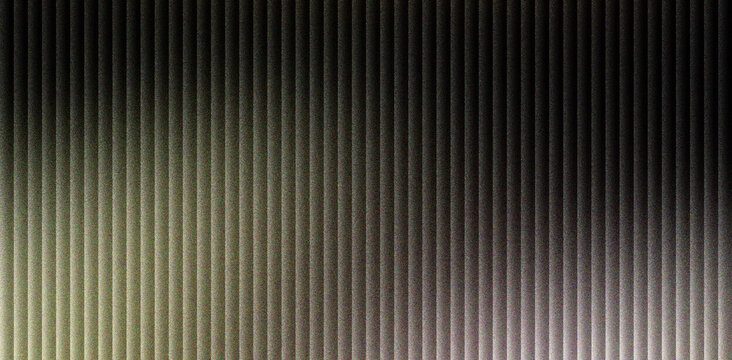 Industrial metal texture with vertical parallel lines. Dark metallic background featuring ribbed steel surface and rhythmic patterns. Grey corrugated iron sheet for architectural design use.