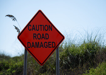Sign caution road damaged © Penny Britt
