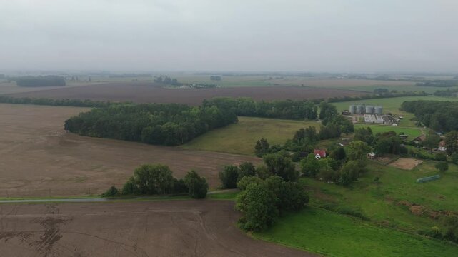 Village Rooftops and Farm Silos on Ruegen Island Drone View