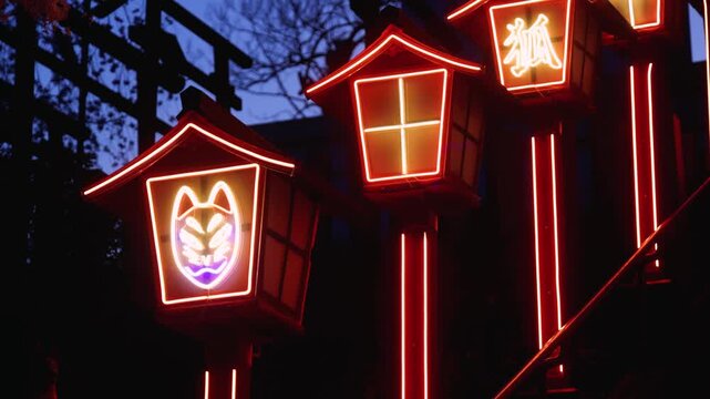 Nakatsukasa Magotaro Inari cyber shrine, Nishi Park, Chuo Ward, Fukuoka City, illuminated staircase with neon lit fox lanterns at night, Kyushu island, Japan, torii gate with cherry blossoms