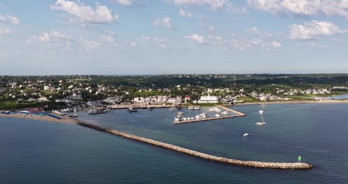 New Shoreham, RI USA - August 12, 2026 - Morning aerial video, panning right to left, of Block Island's Old Harbor on a sunny summer day, 4096 x 2160, Frame rate 29.97 fps.