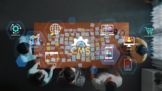 Team Collaboration Around Table for Content Management System Development and E-commerce Strategy Planning with Digital Tools and Graphics. Entropy.