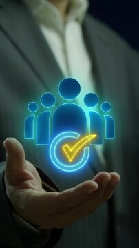 Businessman open hand vertical shot supporting glowing user team avatar with verified checkmark. Qualified human resource recruitment selection, certified talent acquisition, and hiring job concept.
