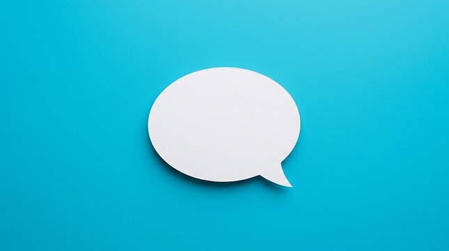 A clean white speech bubble stands out against a bright teal backdrop offering ample room for your message or creative design elements