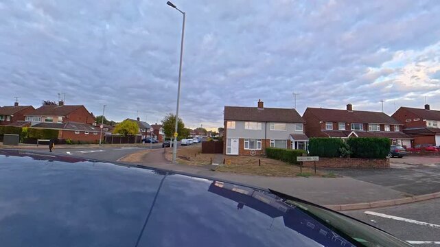 September 4th, 2026. Urban City Streets View of Luton Town of England United Kingdom During Mostly Cloudy Evening. Wide Angle Car Mounted Camera Time Lapse Footage Was Captured During Day Drive. 