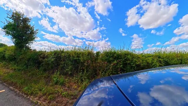 September 4th, 2026. Urban City Streets View of Luton Town of England United Kingdom During Mostly Cloudy Evening. Wide Angle Car Mounted Camera Time Lapse Footage Was Captured During Day Drive. 