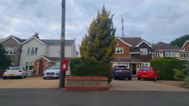 September 4th, 2026. Urban City Streets View of Luton Town of England United Kingdom During Mostly Cloudy Evening. Wide Angle Car Mounted Camera Time Lapse Footage Was Captured During Day Drive. 
