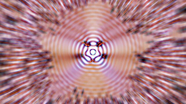 Abstract Radial Kaleidoscope Pattern with Symmetrical Concentric Rings and Motion Blur Effect in Warm Tones