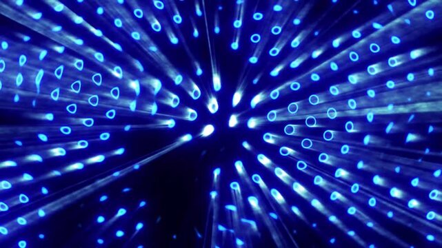 Abstract blue fiber optic cables radiating from center, futuristic technology background with glowing light effects