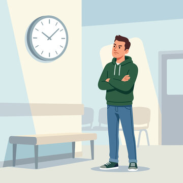 Impatient Young Man in Hoodie Waiting in a Doctor's Office or Waiting Room, Standing with Arms Crossed