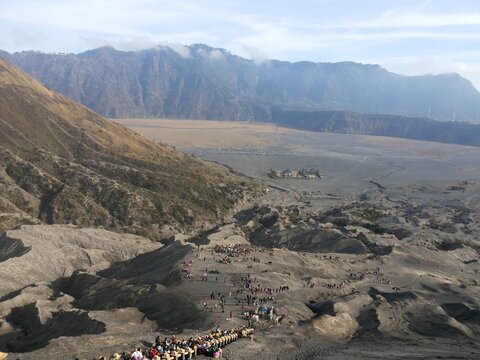 Mount Bromo Volcanic Caldera Landscape with Tourists in East Java Indonesia