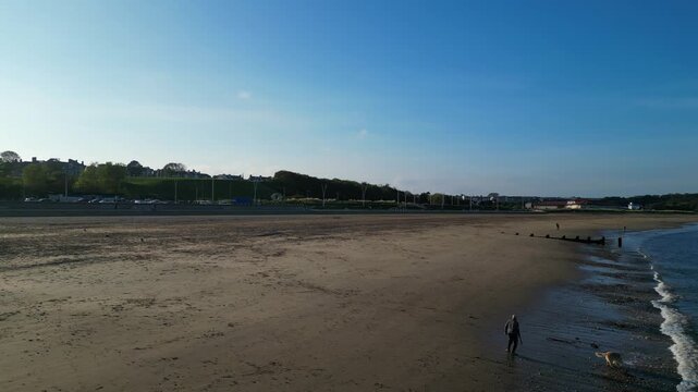 High Angle Drone Camera Footage of Newcastle upon Tyne Beach and Ocean. The Footage Was Captured at Just Before Sunset From Medium High Altitude From Sea Level on 13th October, 2025. 