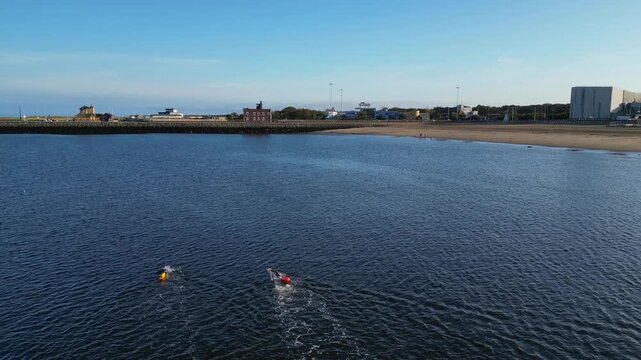 High Angle Drone Camera Footage of Newcastle upon Tyne Beach and Ocean. The Footage Was Captured at Just Before Sunset From Medium High Altitude From Sea Level on 13th October, 2025. 
