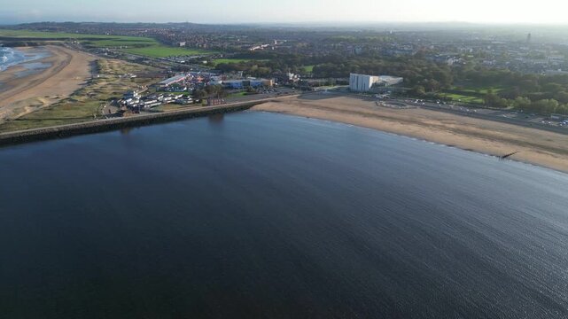 High Angle Drone Camera Footage of Newcastle upon Tyne Beach and Ocean. The Footage Was Captured at Just Before Sunset From Medium High Altitude From Sea Level on 13th October, 2025. 