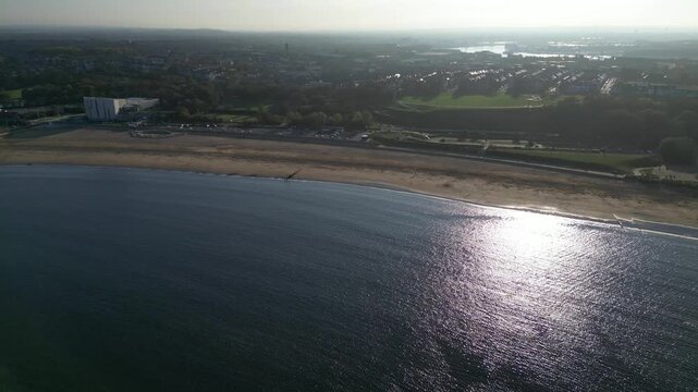 High Angle Drone Camera Footage of Newcastle upon Tyne Beach and Ocean. The Footage Was Captured at Just Before Sunset From Medium High Altitude From Sea Level on 13th October, 2025. 