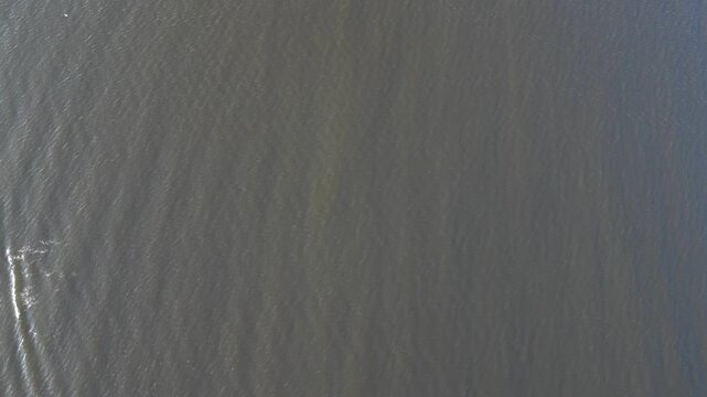 High Angle Drone Camera Footage of Newcastle upon Tyne Beach and Ocean. The Footage Was Captured at Just Before Sunset From Medium High Altitude From Sea Level on 13th October, 2025. 