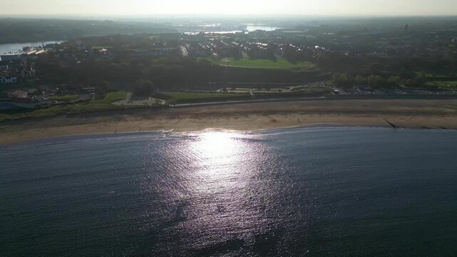 High Angle Drone Camera Footage of Newcastle upon Tyne Beach and Ocean. The Footage Was Captured at Just Before Sunset From Medium High Altitude From Sea Level on 13th October, 2025. 