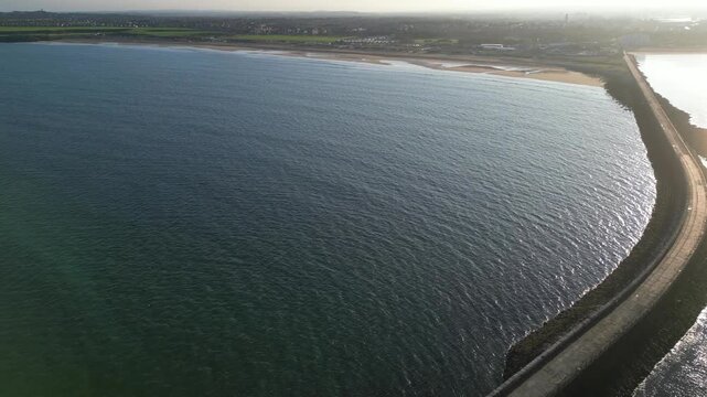 High Angle Drone Camera Footage of Newcastle upon Tyne Beach and Ocean. The Footage Was Captured at Just Before Sunset From Medium High Altitude From Sea Level on 13th October, 2025. 