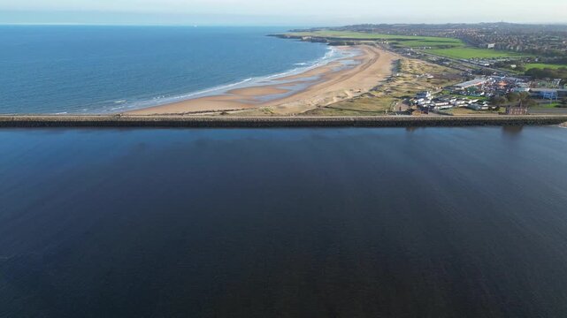 High Angle Drone Camera Footage of Newcastle upon Tyne Beach and Ocean. The Footage Was Captured at Just Before Sunset From Medium High Altitude From Sea Level on 13th October, 2025. 