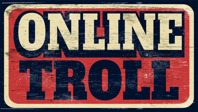 Aged and worn online troll sign on wood