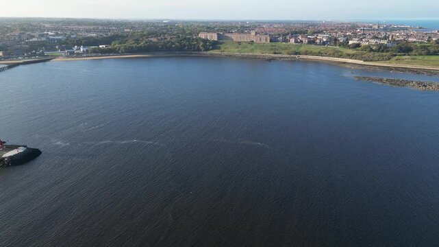 High Angle Drone Camera Footage of Newcastle upon Tyne Beach and Ocean. The Footage Was Captured at Just Before Sunset From Medium High Altitude From Sea Level on 13th October, 2025. 