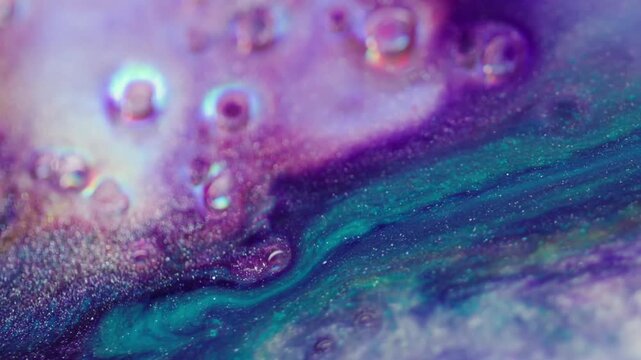 Gradient paint stream. Blur sparkling liquid. Colorful neon glow fluid mixing in purple blue shiny bubble abstract texture background.